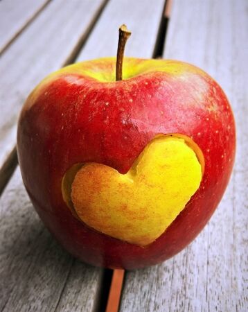 healthy heart shaped appleの写真素材