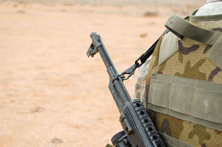AK47 On Soldiers Back