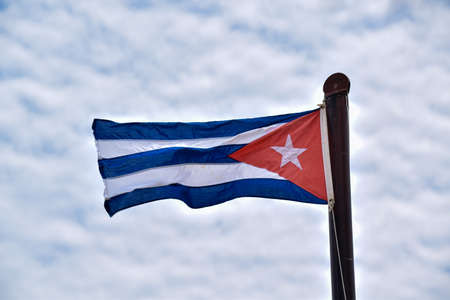 A flag moving by the windの写真素材