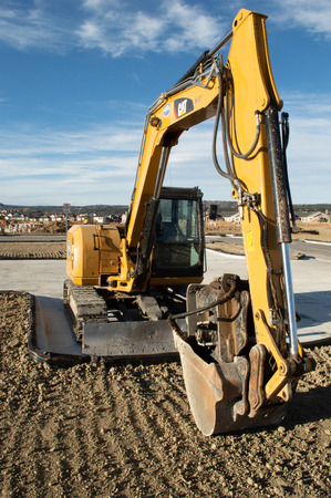 Castle Rock, Colorado / United States - October 28, 2018: Yellow Excavator at Construction Siteのeditorial素材