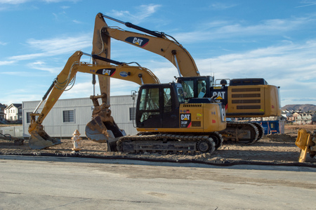 Castle Rock, Colorado / United States - October 28, 2018: Two Yellow Excavators at Construction Siteのeditorial素材