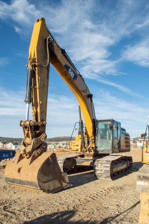 Castle Rock, Colorado / United States - October 28, 2018: Yellow Excavator at Construction Siteのeditorial素材