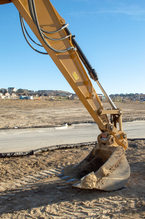 Excavator arm and bucket at a new housing development in Castle Rock, Coloradoの写真素材
