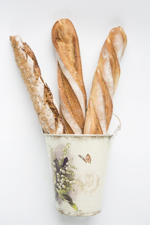 Three french breads in bucketの写真素材
