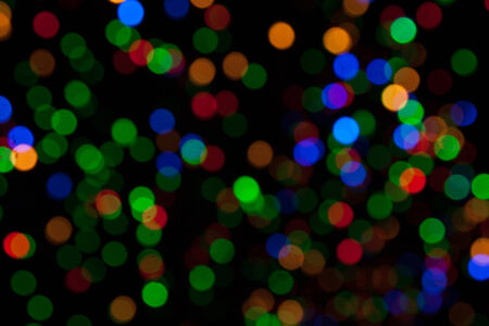 Picture of multi colored Christmas lights taken out of focusの写真素材