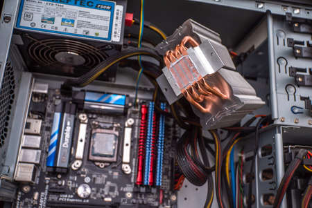 Replacement of thermal paste on processors, computer repair and PC improvement. components for the personal computer. computer system upgrade. Uzhhorod. Ukraine - June 22. 2020のeditorial素材