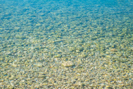 clear transparent water in the sea visible bottom.の写真素材