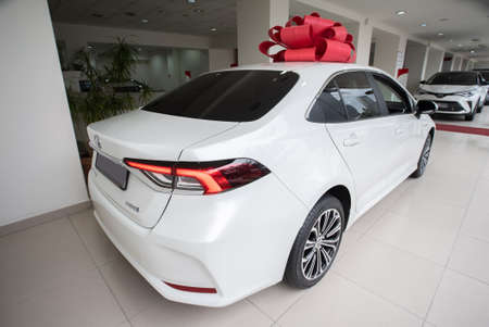 Uzhhorod, Ukraine. March 2021 white car of the Japanese brand Toyota Corolla. Sedan. Reliable and...