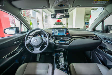 Uzhhorod, Ukraine. March 2021, a white car of the Japanese brand Toyota c-hr. Reliable and beautiful...