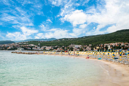 Selce. Croatia July 20, 2021. sandy beach with people. The beginning of a vacation at sea.