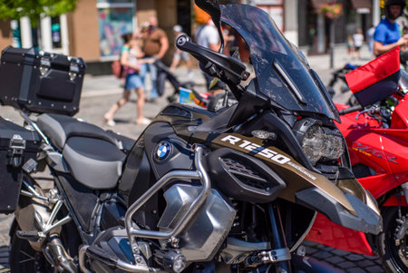 Uzhhorod Ukraine. July 19, 2021 .Parking a motorcycle on the road, choose background focus. biker showのeditorial素材