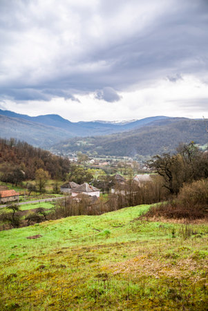 Mountain Village on a Sunny Summer day.Amazing view on a small village on the Mountains .Green...