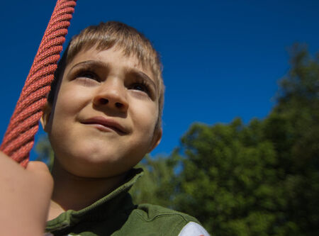 Climb and jump close up of a childの写真素材