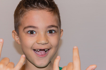 Excited face of a small boyの写真素材