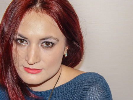 Fashion photo of red hair beauty with natural make-upの写真素材