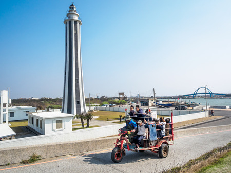 Changhua, Taiwan - Feb 17, 2018: The tourists are sitting on the oyster truck at Wang Gong Fishing Port.のeditorial素材