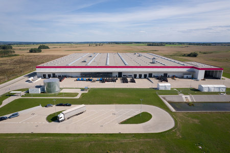 Aerial View of a Large Distribution Center with Parking Lot