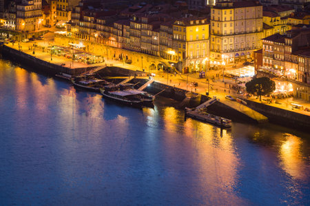 Waterfront and Cityscape at Dusk in Porto, Portugalの写真素材