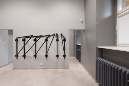 Empty Interior Space with Metal Clothing Rack System