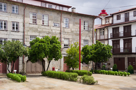 Courtyard and Buildings in a Town Square - Guimaraes Portugal.の写真素材