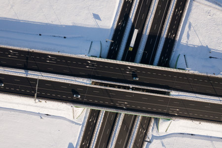 Top-Down Aerial View of Highway in Winter with Snow