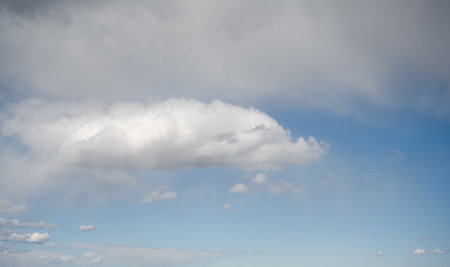 Cloudy Sky: Blue and White Cloudscape.