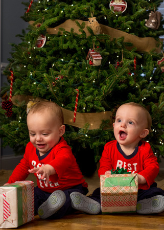 Twin baby boys receive Christmas presents