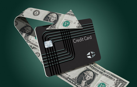 Cash back credit card rewards are illustrated here with a looping arrow made of dollar bills wrapping around a cash back card.の写真素材