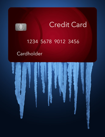 A credit freeze, or freeze on your credit report is represented with icicles and snow on a mock credit card solated on the background. It is an illustration.の写真素材