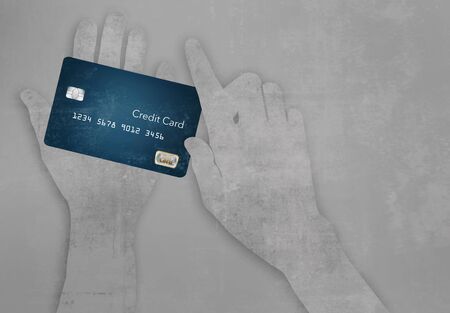 Here is your hard working credit card you use everyday. It is worn and used.の写真素材