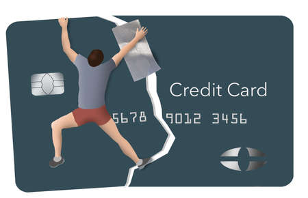 A man uses duct tape as he tries to repair his credit by taping together a broken credit card.の写真素材