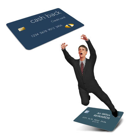 A man is seen making the leap to switch from an air miles reward credit card to a cash back rewards card.の写真素材