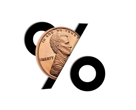 Intrest adds up a little bit at a time. One copper penny is seen  sliding into a percentage symbol in a 3-d illustration about compound interest or APR or other interest growth financial items.の写真素材