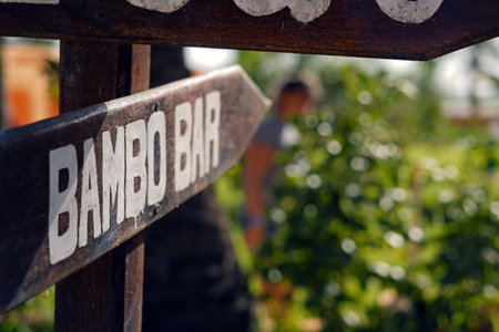 signpost to a bar in Bakau Gambiaの写真素材