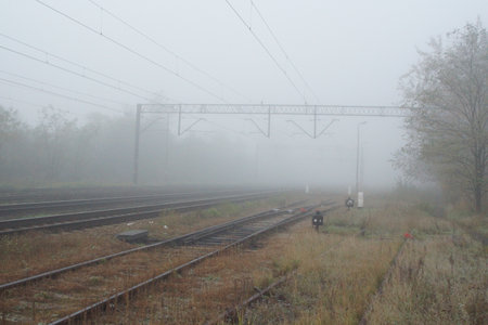 Railway tracks in a foggy morning, closeup of photoの写真素材