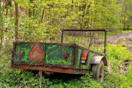 view of an old abandoned trailer in the forestの写真素材