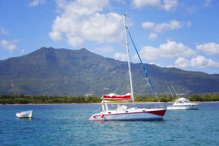 Ship floats on the ocean at Mauritius, Africa の写真素材