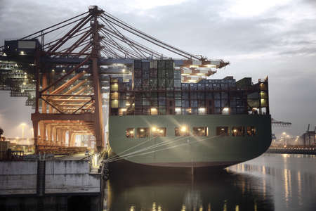 Container ship in the harbor of Hamburgの写真素材