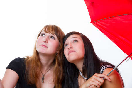 Women with red umbrella - white background の写真素材