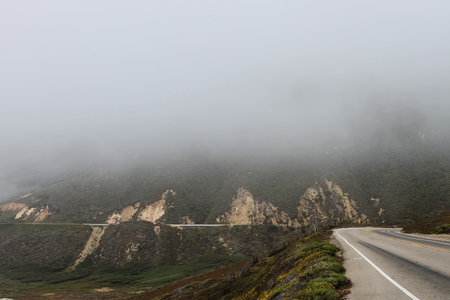 Beautiful clouds crashing on the coast of Monterey, California