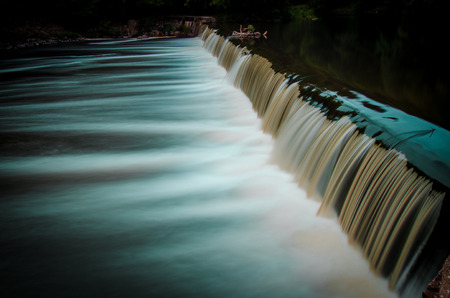 Flow of water of a weir of Germanyの写真素材