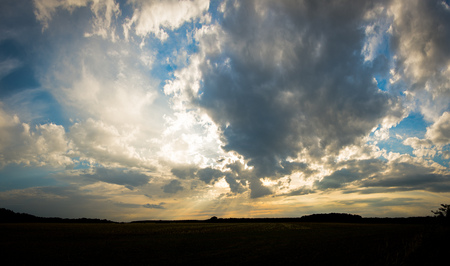 Game of clouds and sunの写真素材