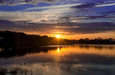 Reflection of a sunset at summer, Leipzig Germanyの写真素材