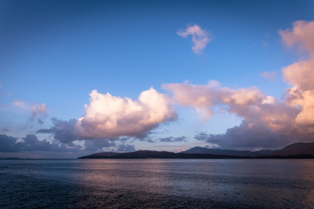 Sunrise over the sea looking out from the Isle of Mullの写真素材