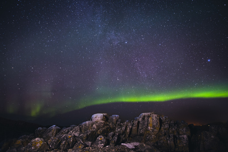 Aurora borealis above the mountains  on Lofoten - Norwayの写真素材