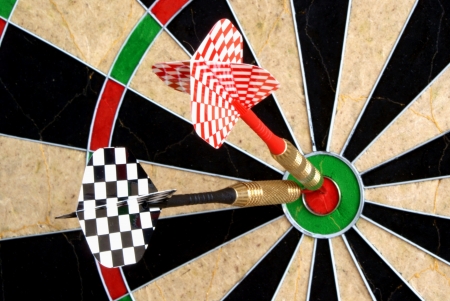 Two little arrows in the bulls eyeの写真素材