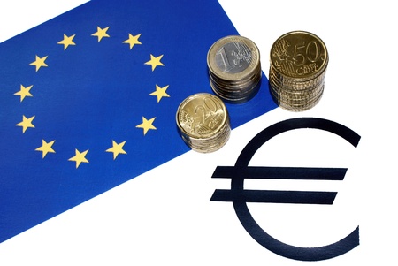 Some Euro coins with the European flag and the euri symbol as background