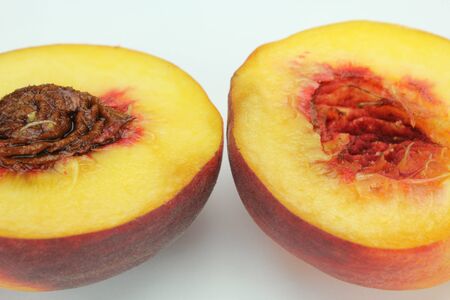 two halves of a peachの写真素材