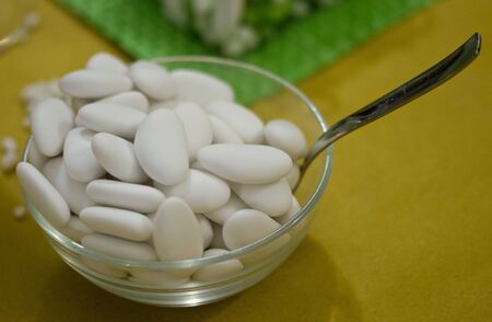 of confetti packs of white and green ceremony for special occasionsの写真素材