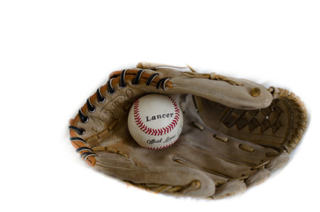 glove leather with baseball stitching and inside a white baseball ball: behind a white backgroundのeditorial素材